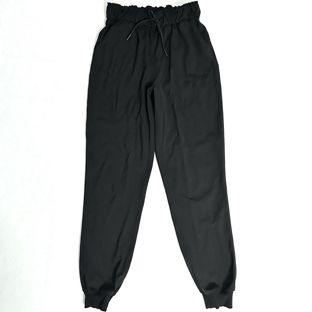 Lululemon Luxtreme Size 4 Black Jogger Pants High Rise Keep Moving Travel Womens
